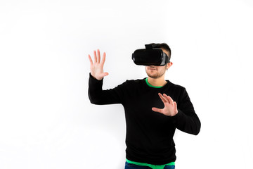 bearded happy young nice and modern with vr glasses that enjoy virtual reality with simulator isolated over white background