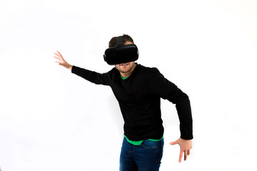 Bearded Young nice and modern with vr glasses that enjoy virtual reality with simulator isolated over white background