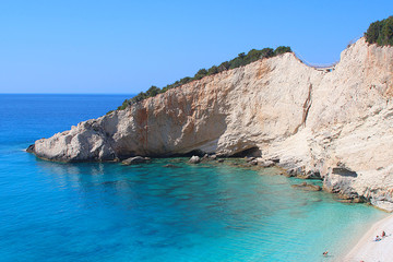 Fototapeta na wymiar Beautiful clear turquoise water at Katsiki beach against white cliffs, Lefkada, Greece