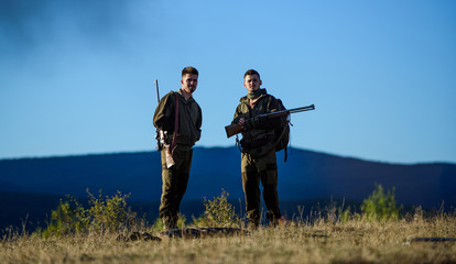 Man hunters with rifle gun. Boot camp. Military uniform fashion. Friendship of men hunters. Army...