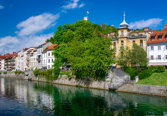 Fototapeta na wymiar Scenic view of embankment of Ljubljanica river in Ljubljana, Slovenia