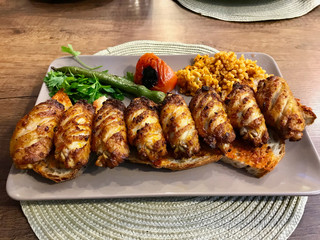 Turkish Style Spicy Chicken Wings Kebab / Kebap served at Restaurant. Traditional Recipe
