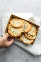 Homemade cat's tounge cookies with milk on marble background. Langues de chat.