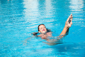 Summer vacation and travel to maldives. Sexy woman in swimming pool. Sexy girl with red lips and...