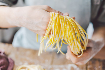 Chef making fresh italian pasta