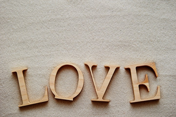 Word love on sand