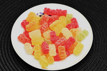 teddy gelatin,gummies,gummi bears on a porcelain plate