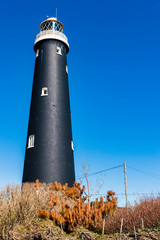 The old Lighthouse at Dungeness in Kent, England. This lighthouse is a grade 11 building and was...