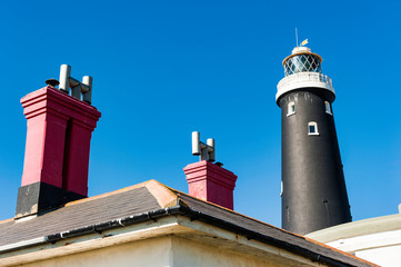 The old Lighthouse at Dungeness in Kent, England. This lighthouse is a grade 11 building and was...