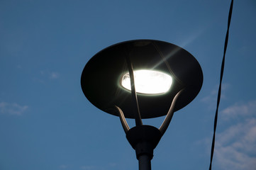 street lamp on background of blue sky