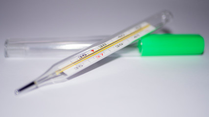 Medical thermometer on white background