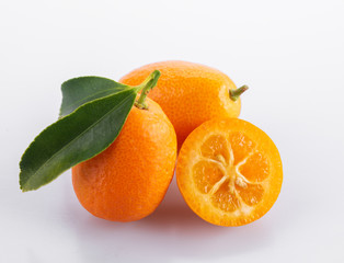 Cumquat or kumquat with isolated panicle leaves on a white background