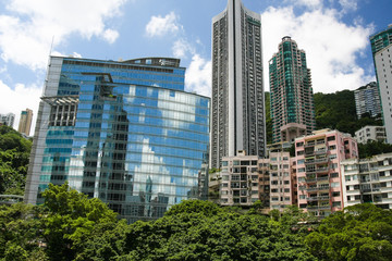 Fototapeta na wymiar Buildings and trees in Hong Kong landscape