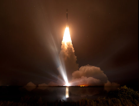 Missile launch at night. The elements of this image furnished by NASA.