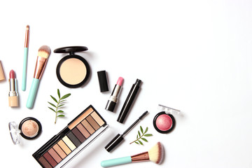 professional makeup tools. Products for makeup on a white background top view. A set of various...