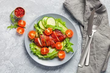 Chicken meat and vegetables salad.