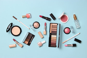  professional makeup tools. Makeup products on a colored background top view. A set of various...