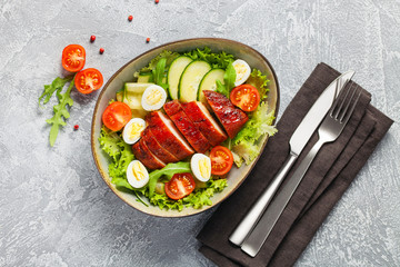 Chicken meat and vegetables salad.