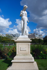 the statue of the nymph in the background of the blue sky,
