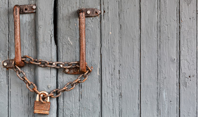 Very old lock on a wood door