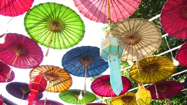 Lanna style, Paper umbrellas multicolored Colorful lamps decorated in Thai temple which is famous tourist attraction in Nan Province Thailand