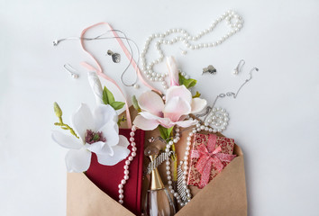 Magnolia flowers, pearls, perfume bottle, gift box, jewelry, envelope
