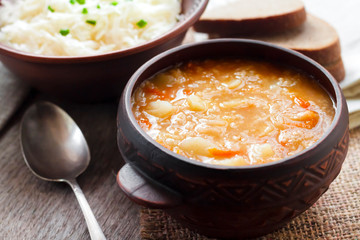 Kapustnyak - traditional Ukrainian winter soup with sauerkraut, millet and meat