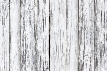 Fototapeta na wymiar Gray wood structure covered with white paint. Weathered desk peeling layer grunge backdrop for graphic design.