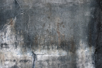 シミとヒビのあるコンクリート