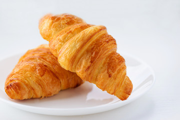 Croissants on white background