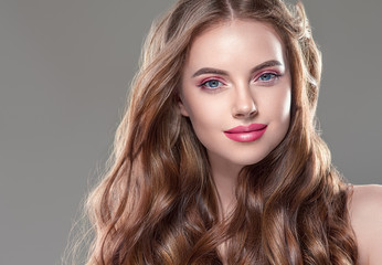 Fototapeta premium Beautiful long hair brunette woman with beauty hairstyle female model
