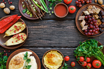 Dishes and snacks Middle Eastern or Arabic cuisine. Meat kebab, baked peppers and eggplants,...