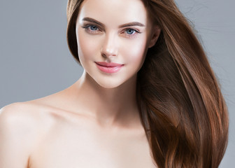 Obraz premium Beautiful hair woman long brunette hairstyle female healthy skin beauty makeup cosmetic concept