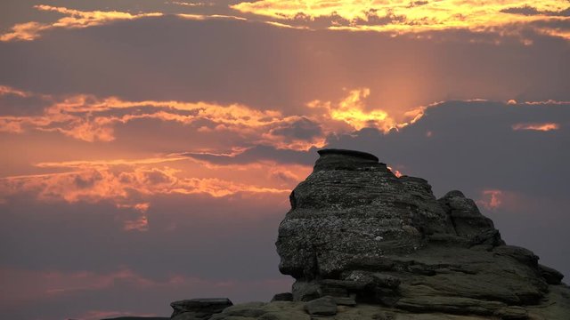 The Sphinx Rock (Sfinxul) in Bucegi Mountains Romania at sunset