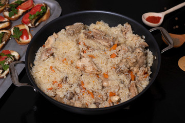 ready meal to eat, asian food into cauldron and spices,top view