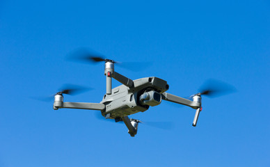 The drone copter flying with digital camera.
