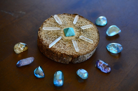 Beautiful, sparkling healing crystals. Witchy crystal grid, wiccan alter set up. Healing energy, shot in natural lighting with low exposure. Crystal Grid, sacred space. Bohemian decorations, romantic 