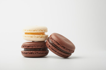 delicious dessert pastries French macaroons on white background