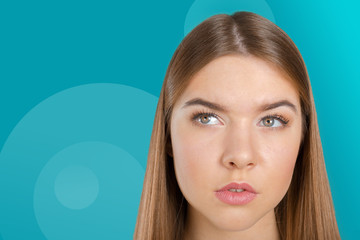 Thinking woman standing pensive contemplating looking skeptic