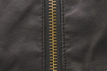 Zipper, lightning on black leather