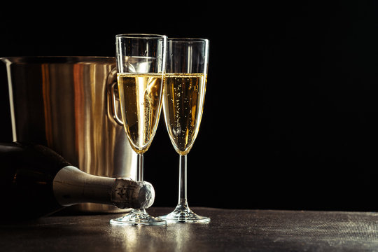 Champagne on the black background