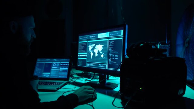 Internet fraud, darknet, data thiefs, cybergrime concept. Hacker attack on government server. Dangerous criminals coding virus programs.