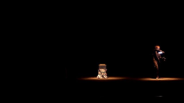 4 people dancing in costumes of LEDs