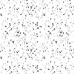 Simple hand drawn black and white pattern with brush spray dots