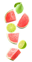 Falling watermelon and lime isolated on white