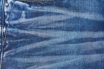 Blue jeans with pleats textured background