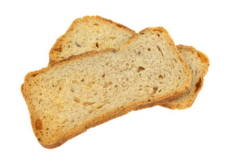 Slices of rye melba toast on a white background