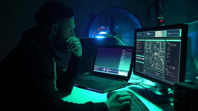 Hackers breaking server using multiple computers and infected virus ransomware. Cybercrime, information technology, phishing mail.