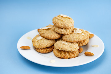 Gluten-Free Cookies almond with almond slice in white plate.