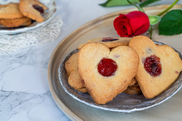Shortbread hearts with cherry jam. Valentine food idea.